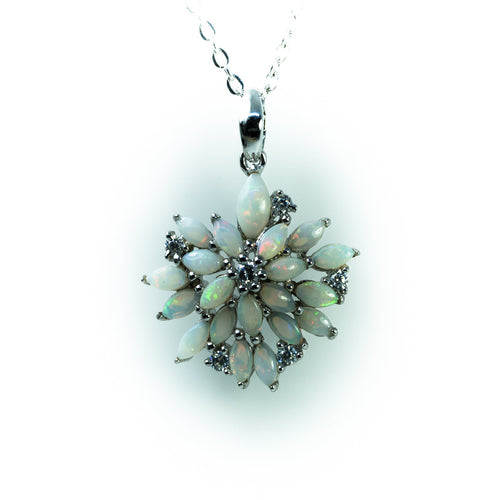 Opal pendant necklace on a white background